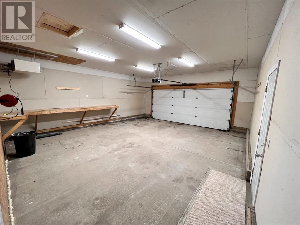Grande Prairie Mission Heights family home — double attached garage