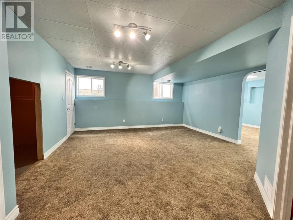 Grande Prairie Mission Heights family home — basement rec room