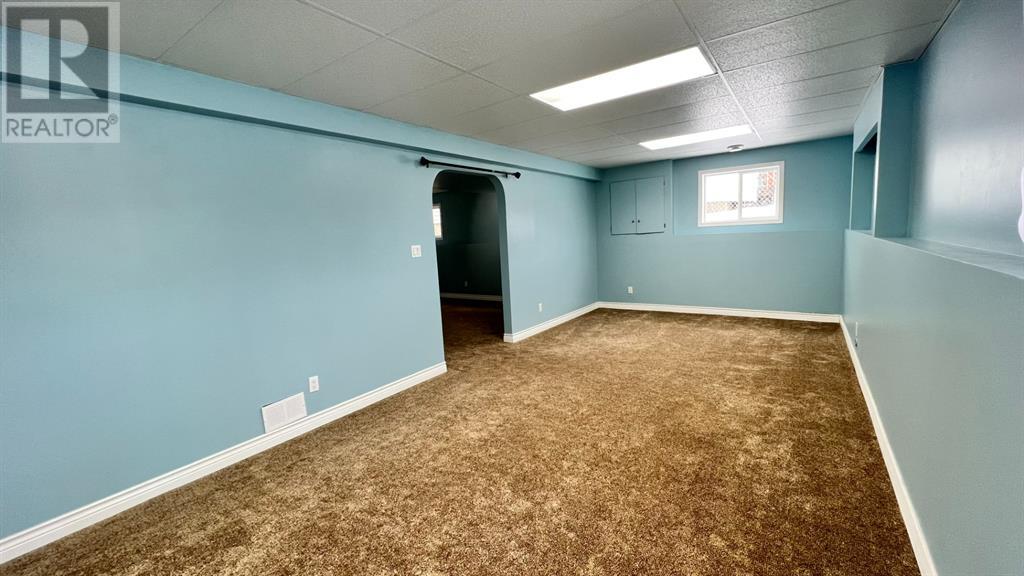 Grande Prairie Mission Heights family home — basement family room