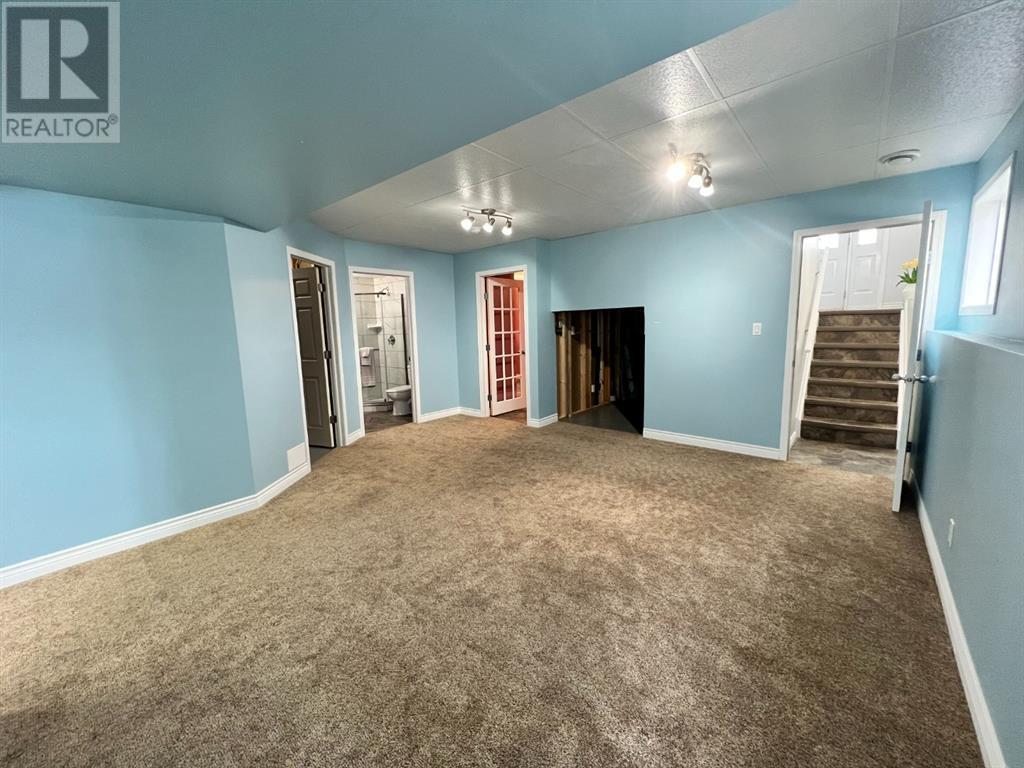 Grande Prairie Mission Heights family home — basement open layout
