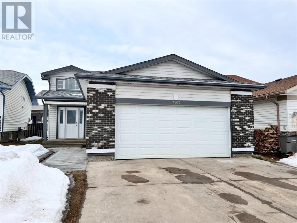 Grande Prairie Mission Heights family home — front entry and door