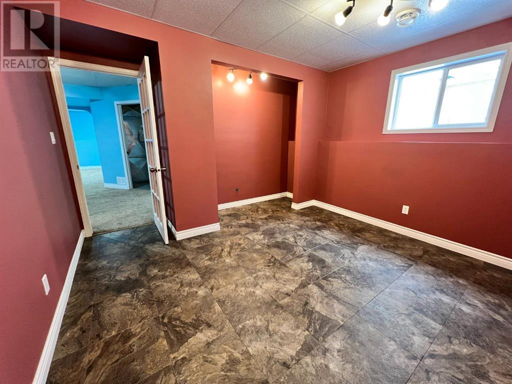 Grande Prairie Mission Heights family home — basement den