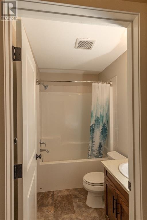 Garry Station family home — basement rec room with fireplace