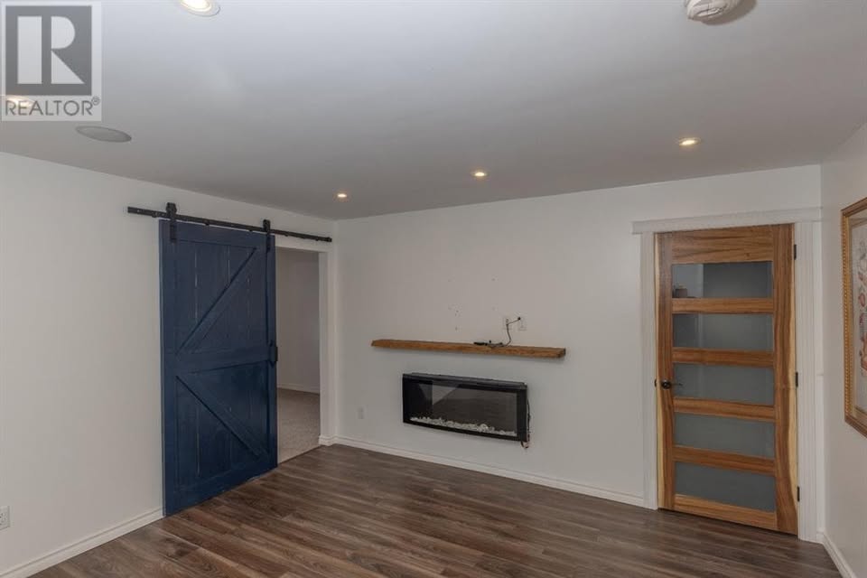 Garry Station family home — bedroom with ceiling fan