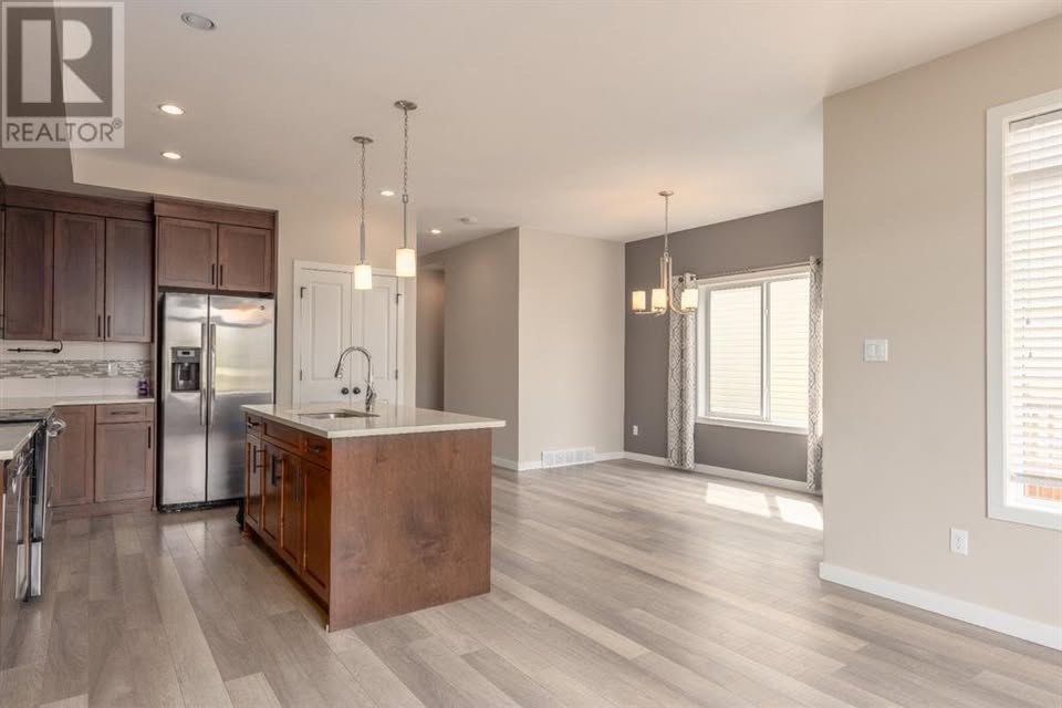 Garry Station family home — kitchen with quartz countertops