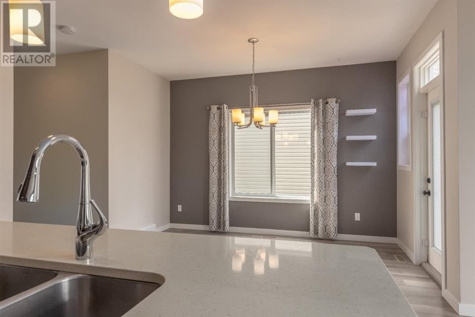 Garry Station family home — kitchen stainless appliances