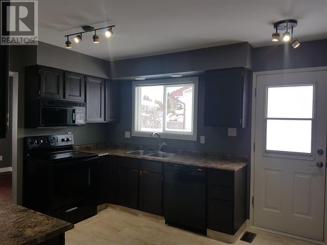 Prince George Foothills — kitchen with track lighting